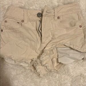 American Eagle Cream Distressed Denim Shorts